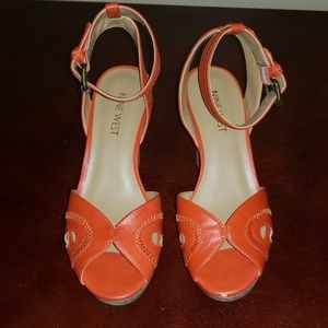 Orange wedge sandals